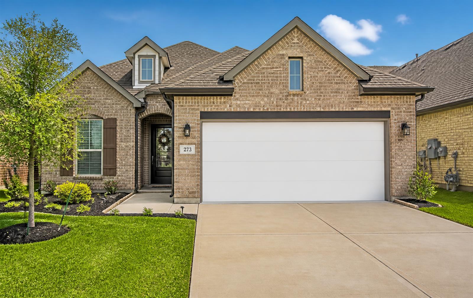 New garage door installed on a Garland, TX home